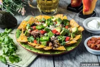 Loaded Pork Carnitas Nachos with Avocado Salsa