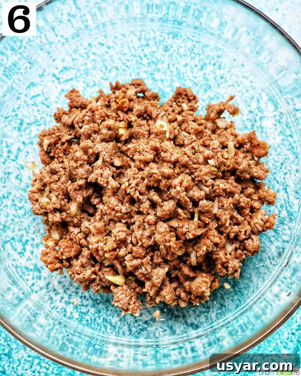 Breakfast Sausage and Potato Hash Recipe 14 Cooked sausage mixture in a bowl