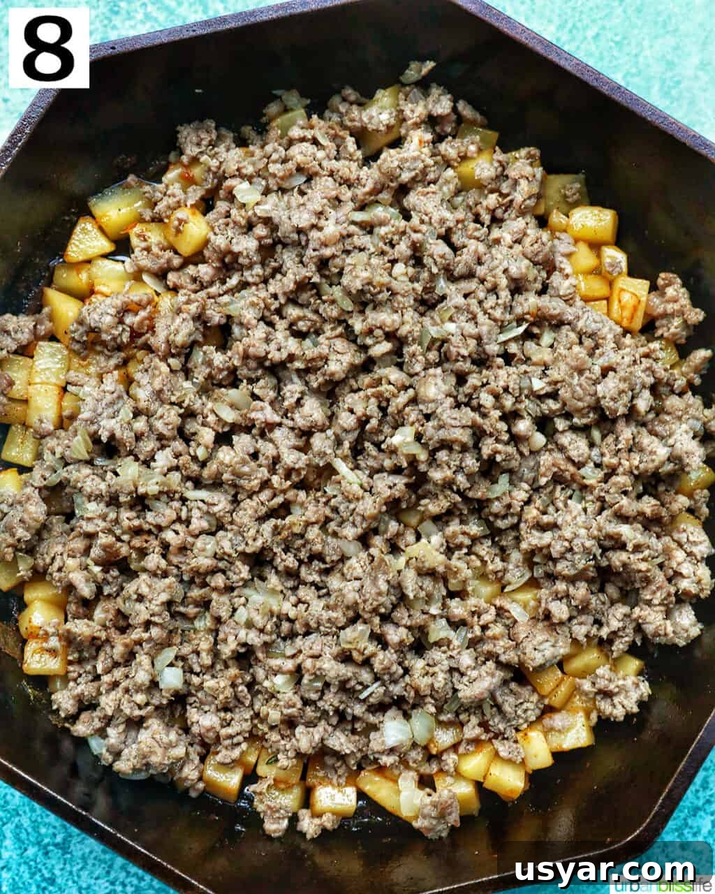 Breakfast Sausage and Potato Hash Recipe 17 Returning sausage mixture to skillet