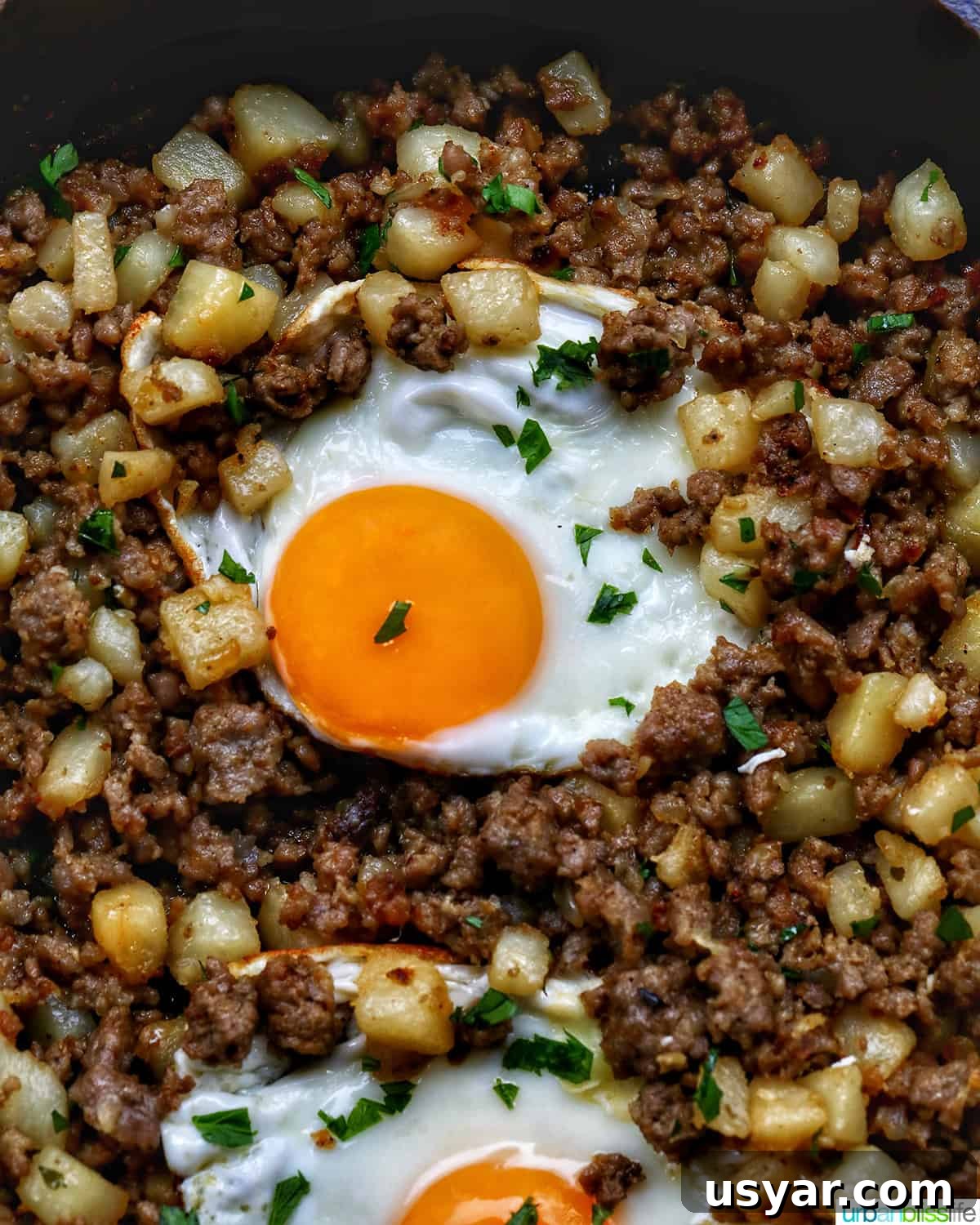 Breakfast Sausage and Potato Hash Recipe 20 Breakfast sausage potato hash topped with fried eggs