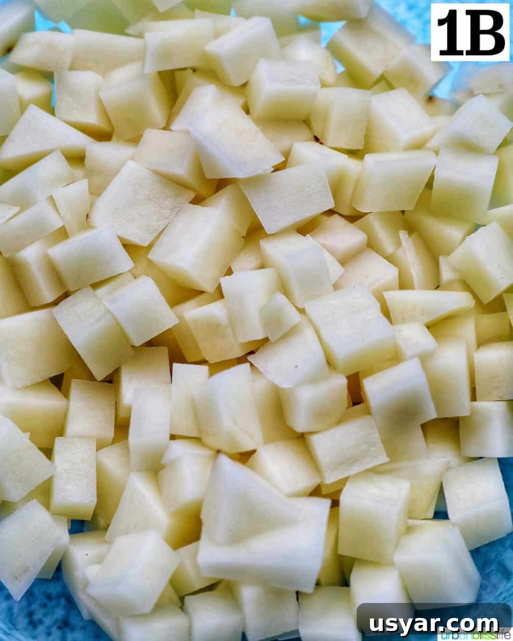 Breakfast Sausage and Potato Hash Recipe 6 Draining diced potatoes