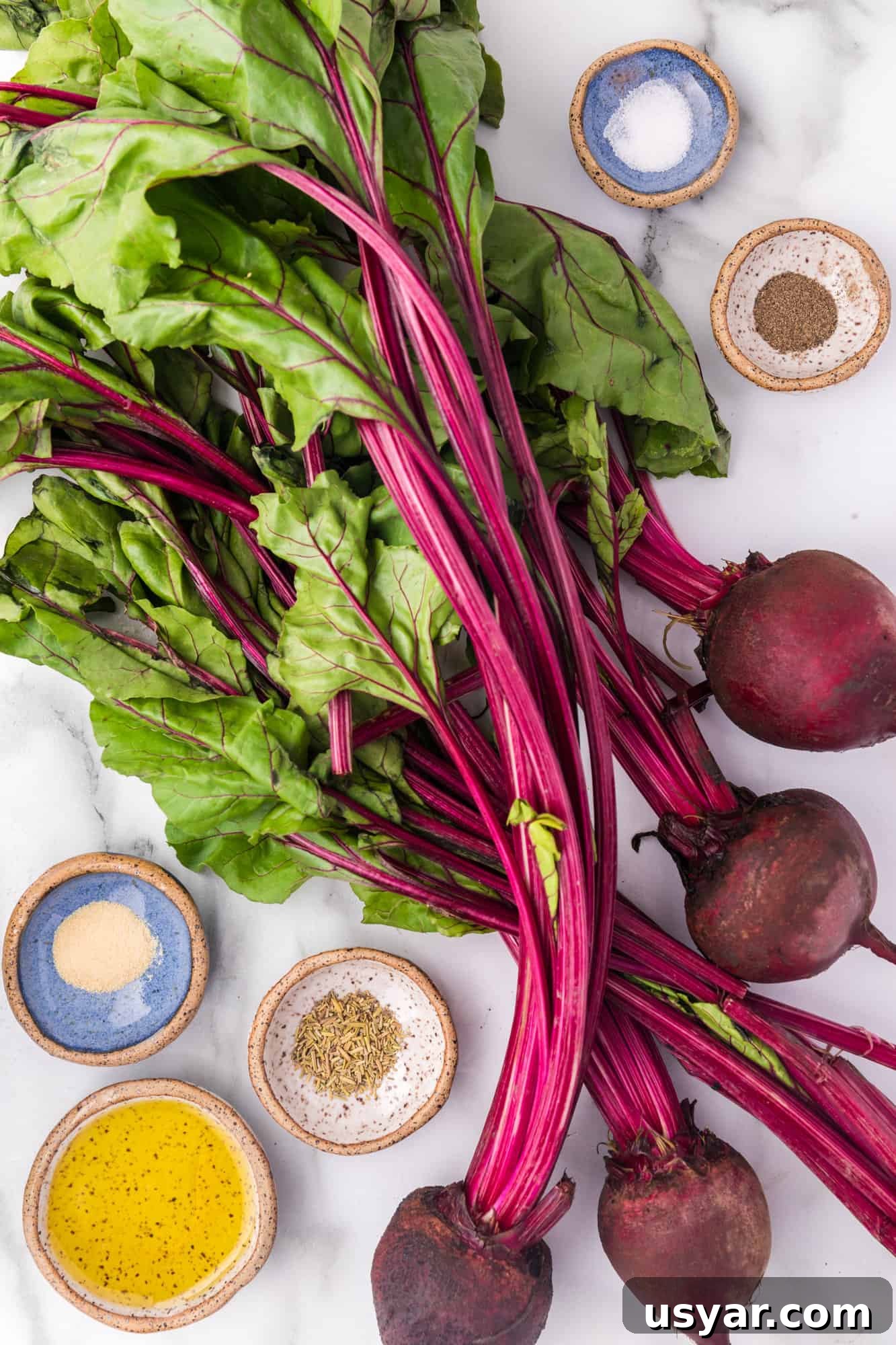 Roasted Beets Recipe with Balsamic and Goat Cheese 5 Ingredients needed for recipe, overhead view.