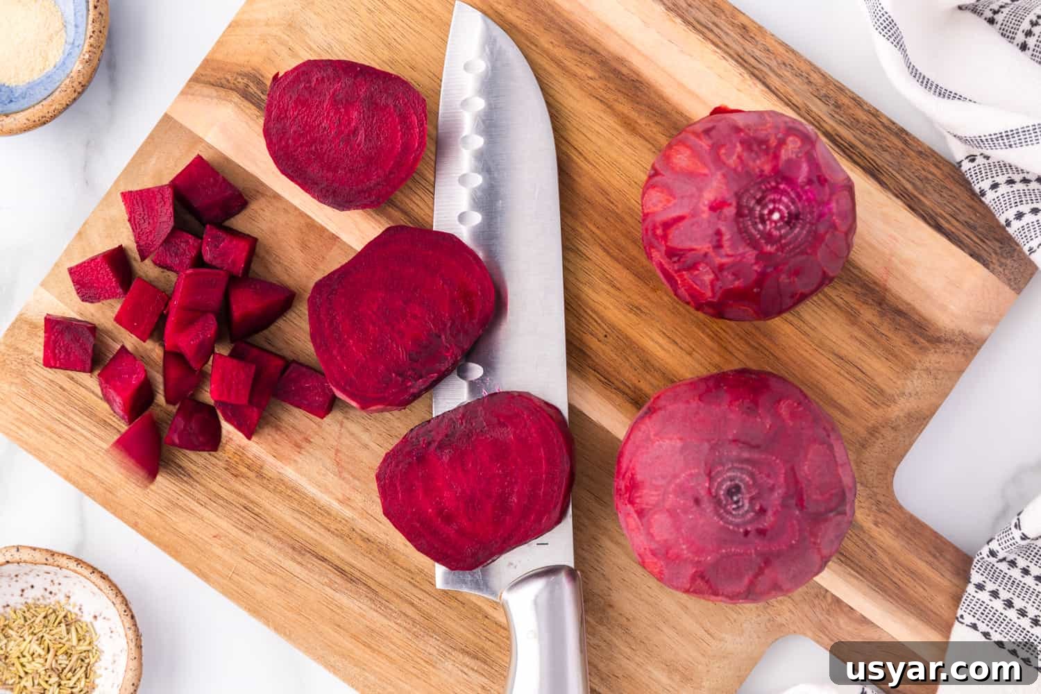 Roasted Beets Recipe with Balsamic and Goat Cheese 7 Peeled beets being cut.