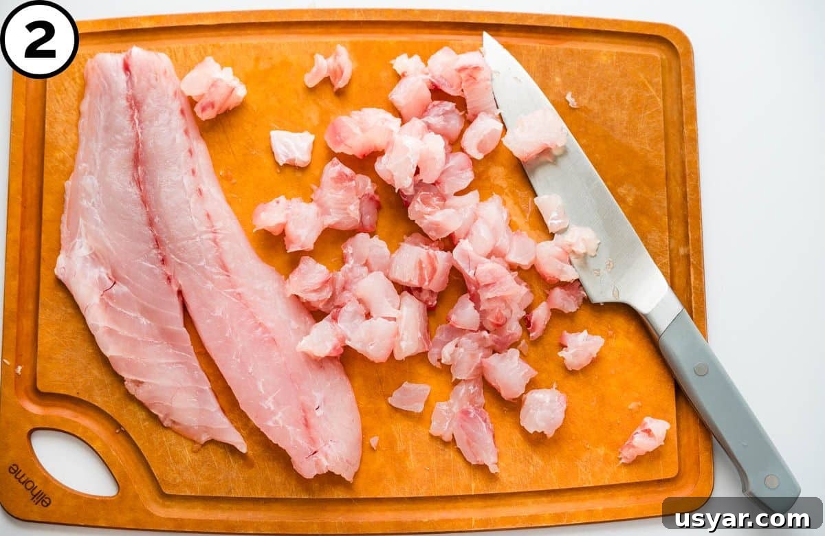 Cutting snapper for the recipe.