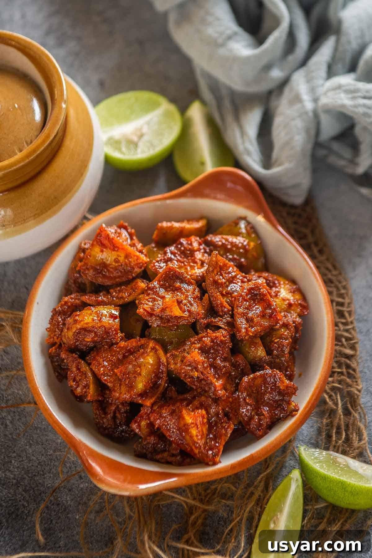 Traditional Lemon Pickle (Elumichai Oorugai) Recipe 2 Elumichai Oorugai served in a bowl.