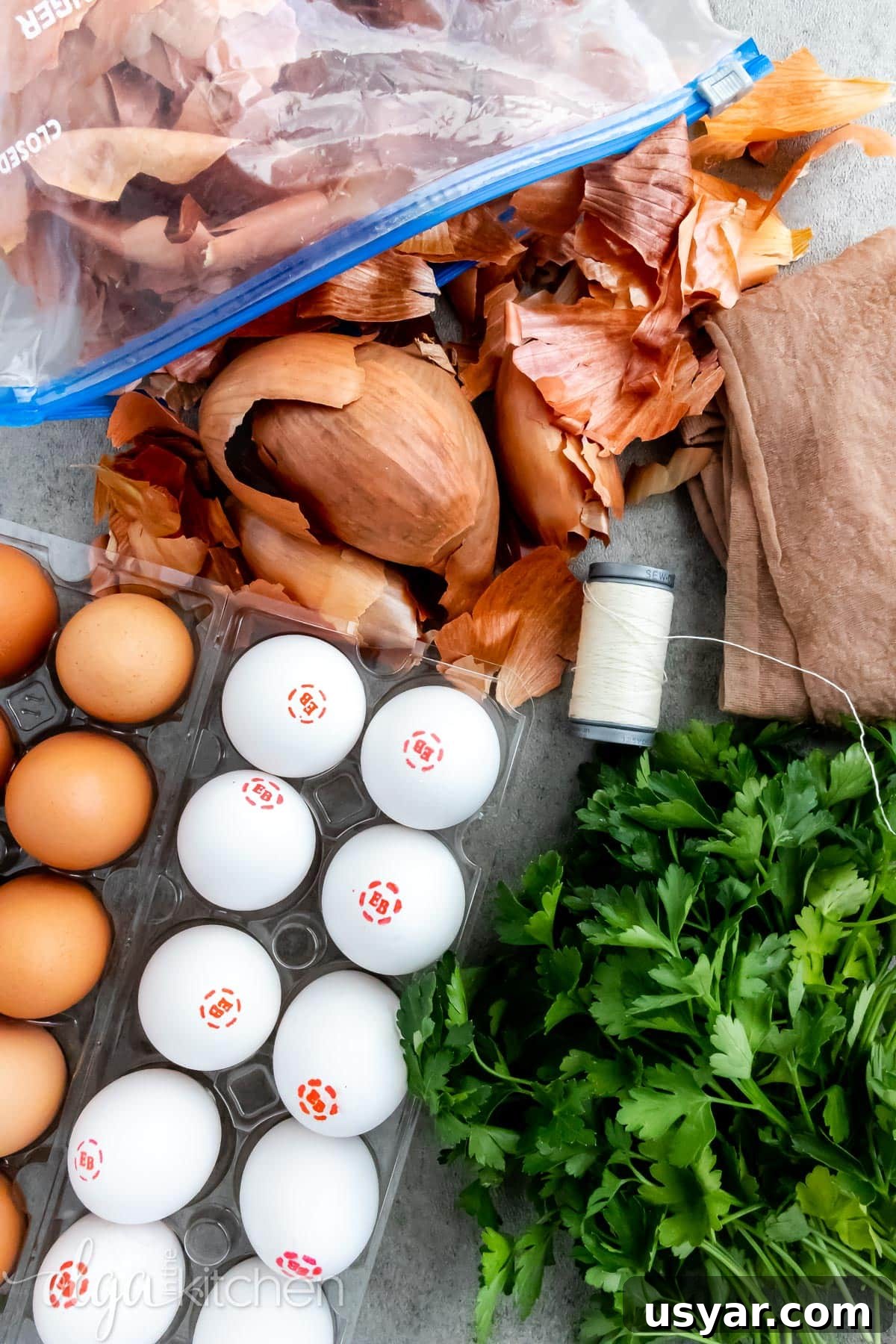 Ingredients for naturally dyed Easter eggs: onion peels, herbs, stockings and eggs. Ingredients for natural egg dye.