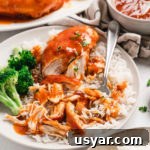 Slow Cooker Apricot Chicken Recipe 2 Tender apricot chicken breasts served over rice with sauce