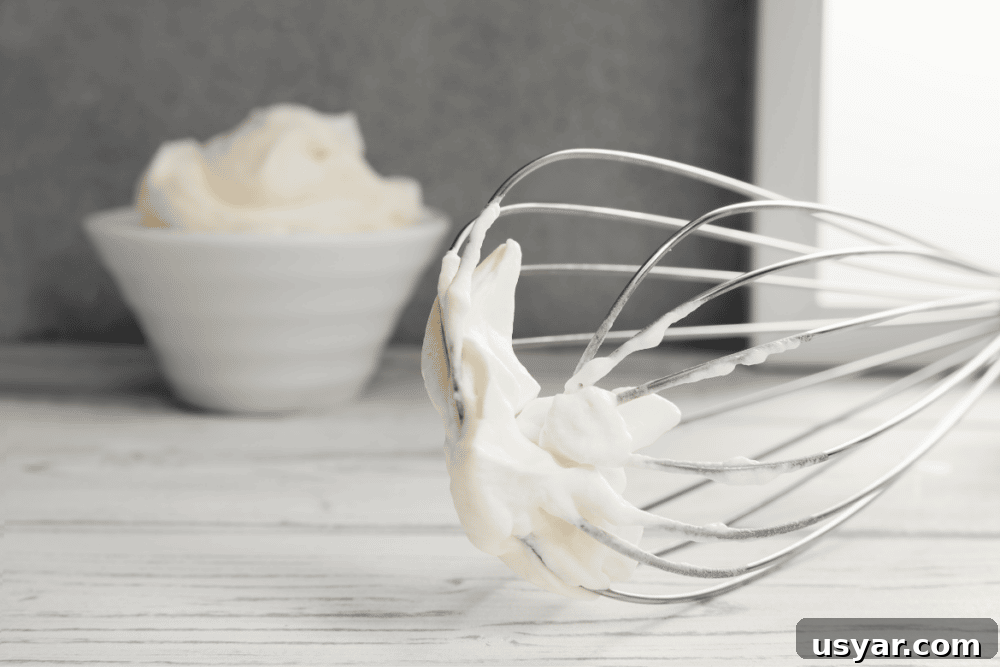 Keto Whipped Cream Recipe Whisk In Post Image keto whipped cream on a whisk