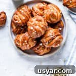 Swedish Cardamom Buns Recipe 20 overhead shot of a plate with golden cardamom buns