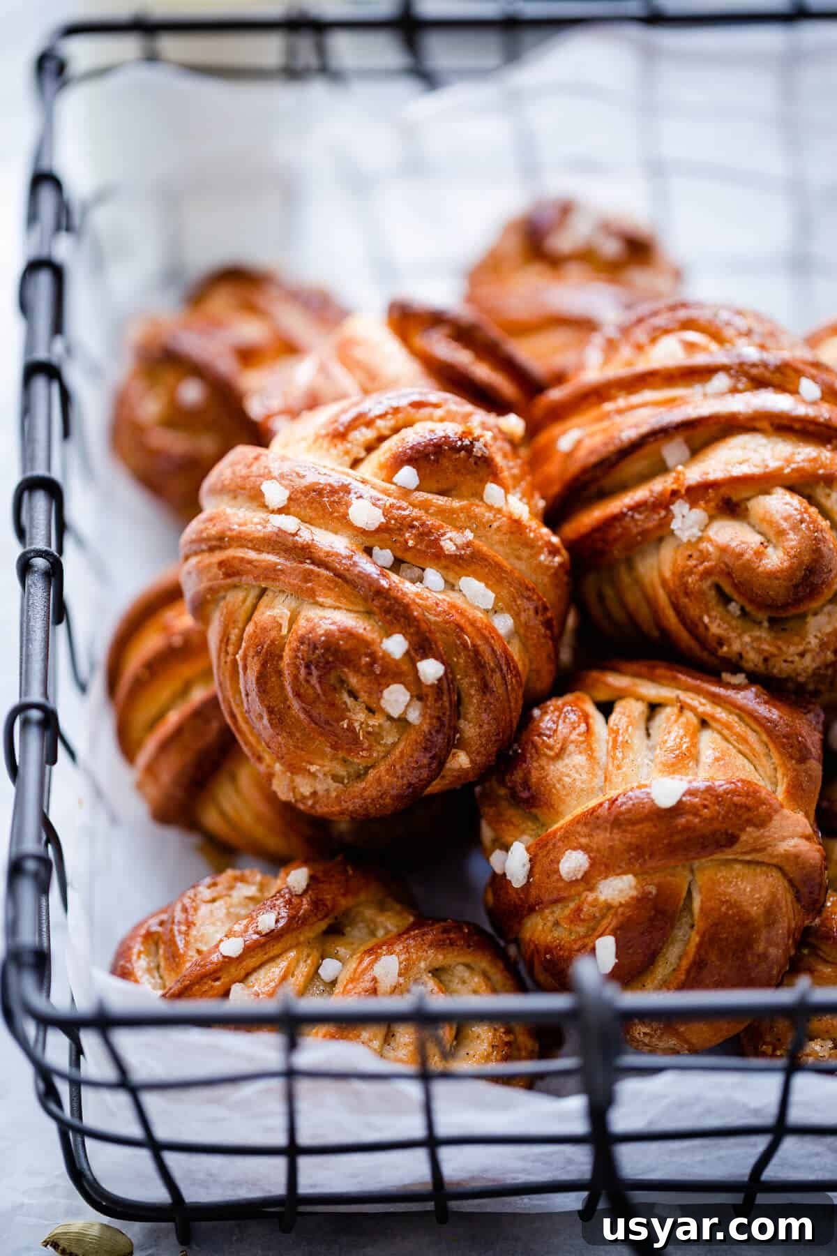 Swedish Cardamom Buns Recipe 4 side close up of buns with sugar pearls