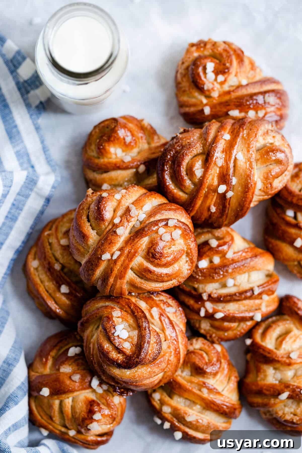 Swedish Cardamom Buns Recipe 6 close up of cardamom buns topped with sugar pearls