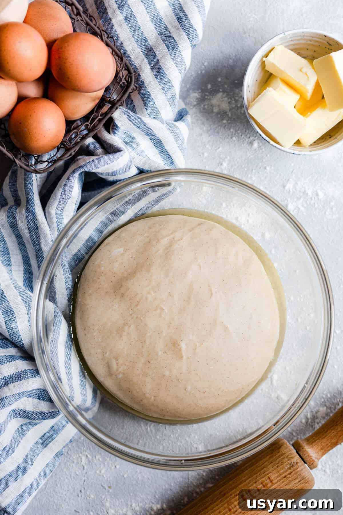 Swedish Cardamom Buns Recipe 7 overhead shot of a bowl with dough