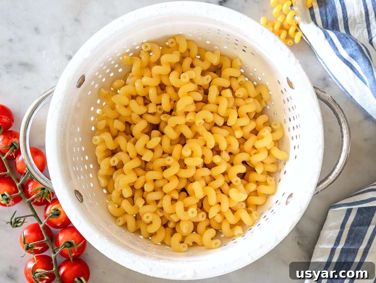 Pesto Pasta Salad with Marinated Butter Beans Recipe 6 Step 2 pasta cooked al dente and drained in a colander.