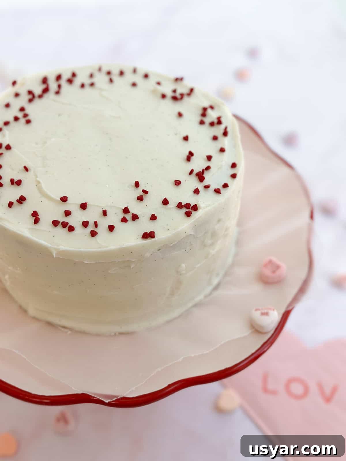 Mini Red Velvet Cake with Cream Cheese Frosting 3 the whole cake on a cake stand.