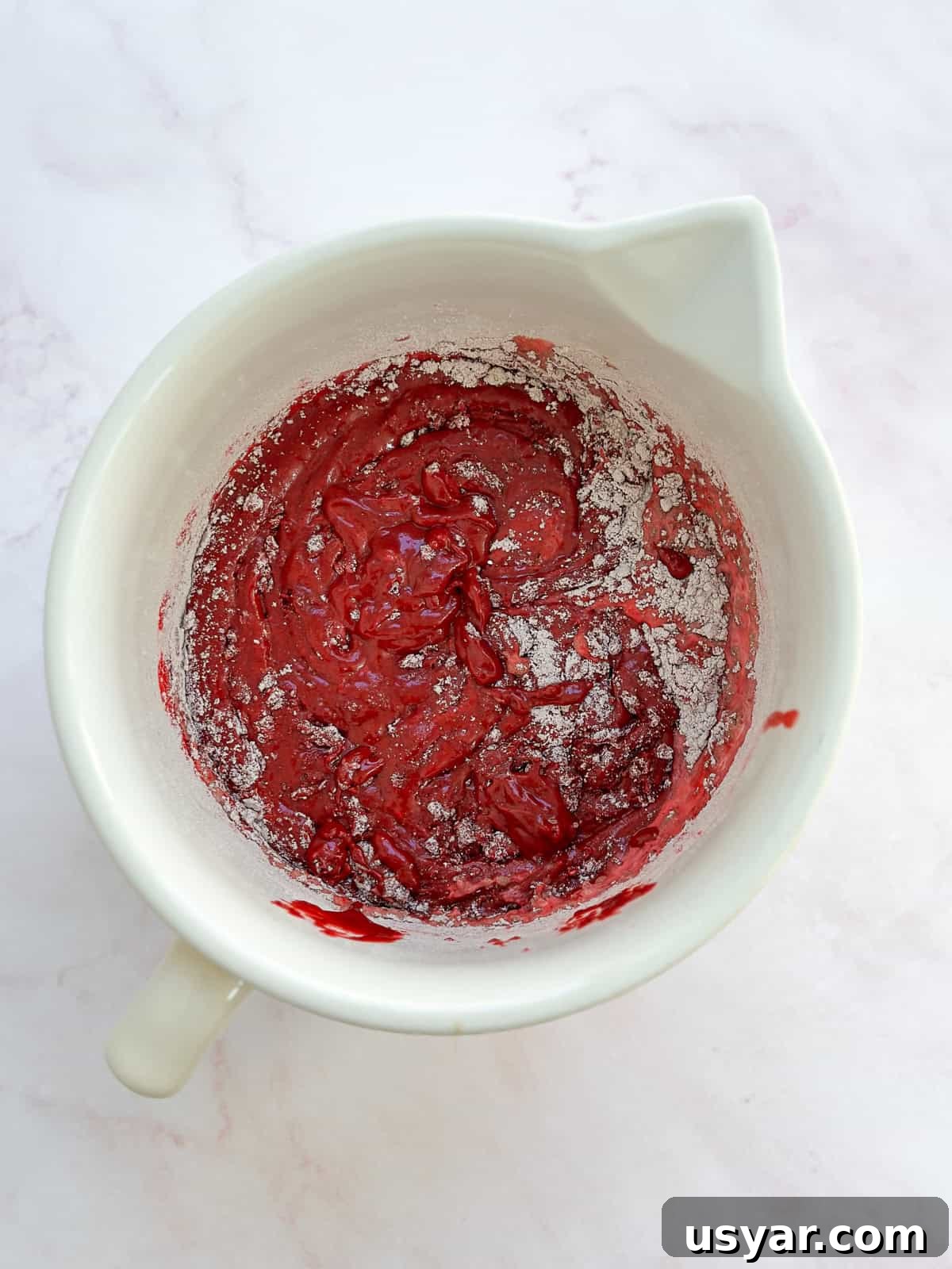 Mini Red Velvet Cake with Cream Cheese Frosting 6 adding in the dry ingredients.