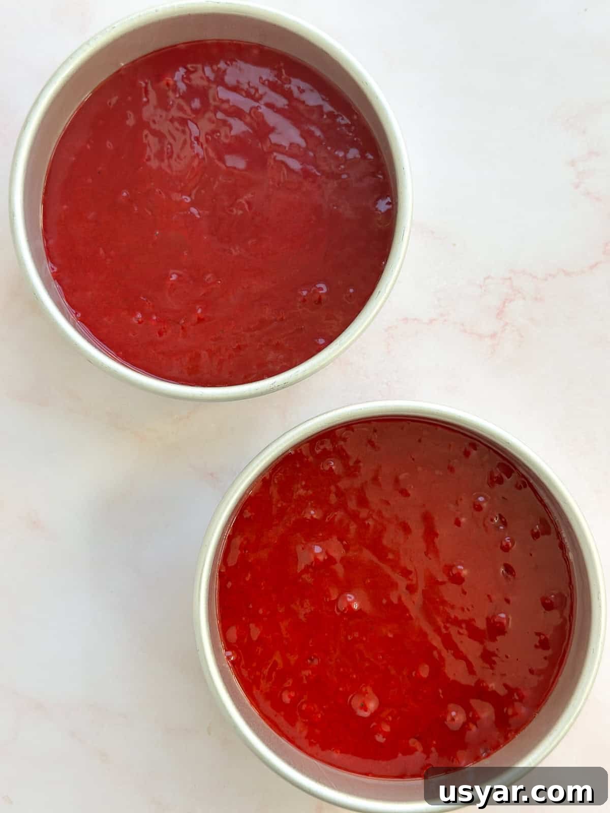 Mini Red Velvet Cake with Cream Cheese Frosting 7 batter in the cake pans.