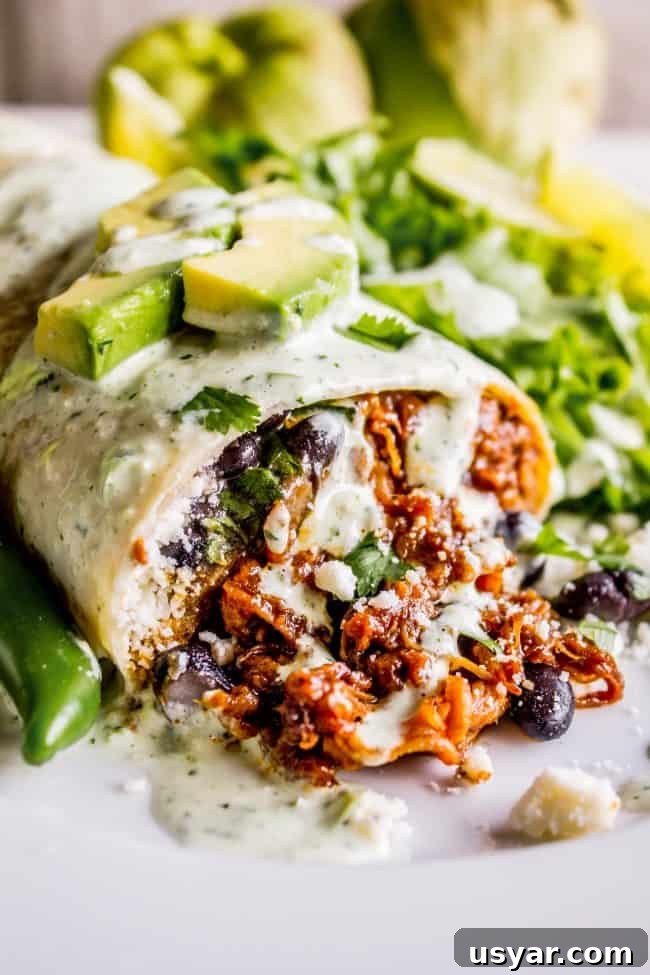9 Slow Cooker Recipes for Halloween Dinner 15 smotheres burrito with sweet pulled pork
