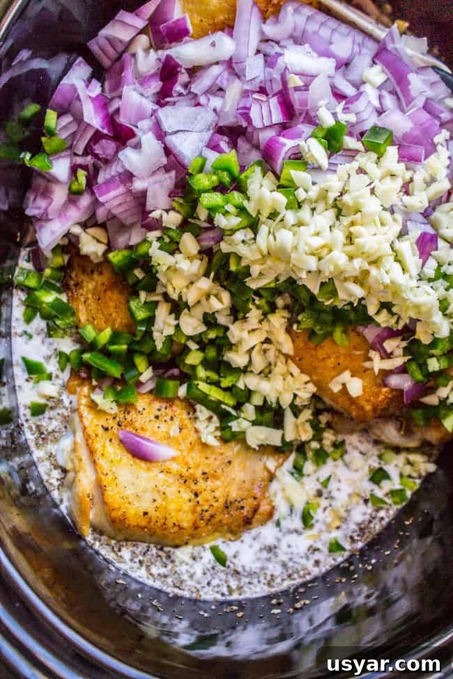 9 Slow Cooker Recipes for Halloween Dinner 4 Slow Cooker Basil Chicken in Coconut Curry Sauce from The Food Charlatan