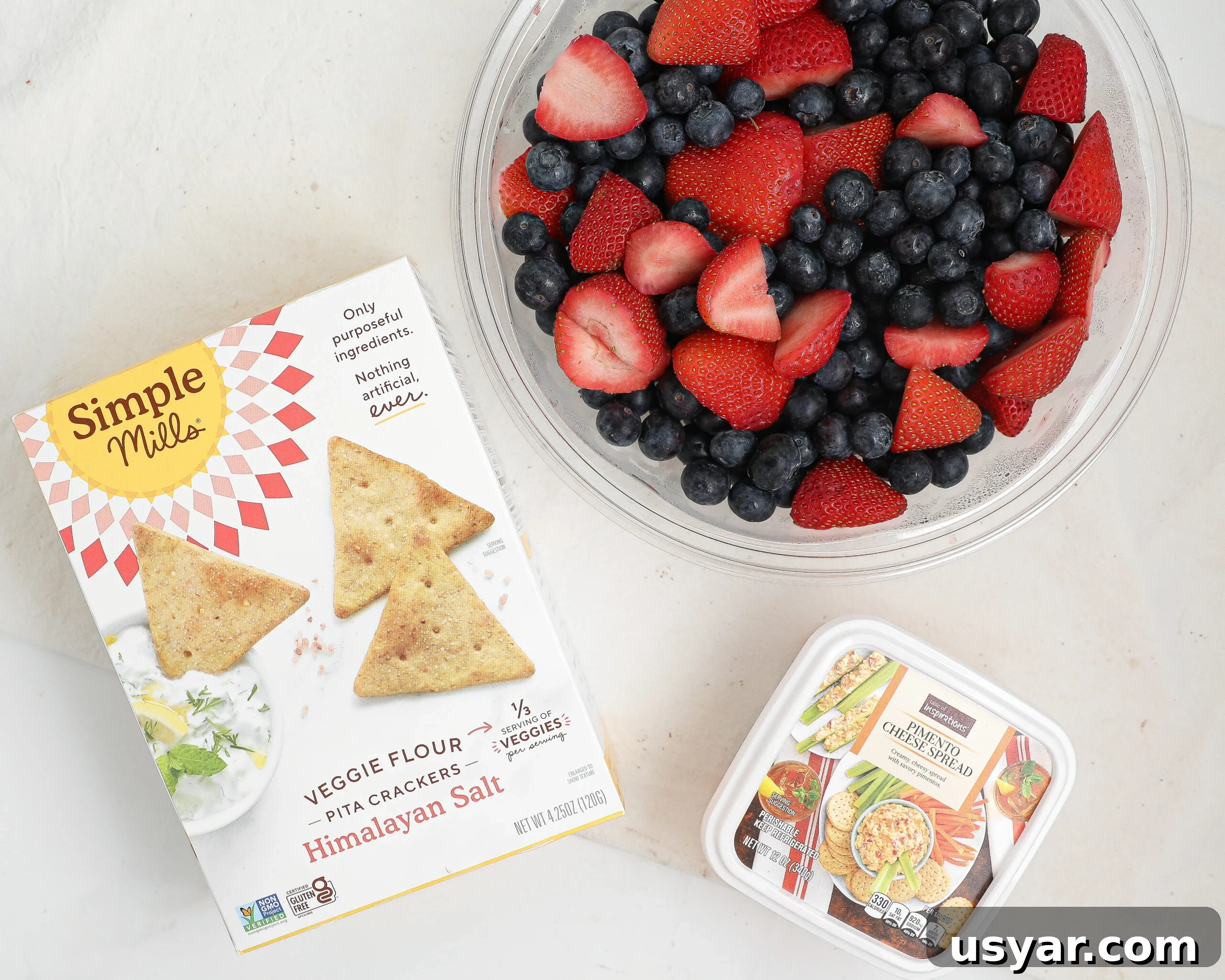 Food Lion beach snacks with fresh fruit, Simple Mills crackers, and ready-made pimento cheese spread