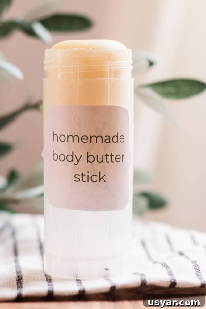 Homemade body butter in clear twist up container.