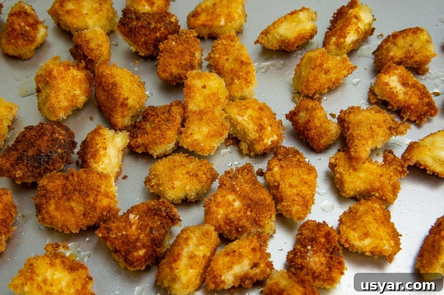 a sheet pan of crispy chicken bites