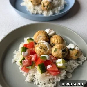 Chicken feta meatballs served over rice.