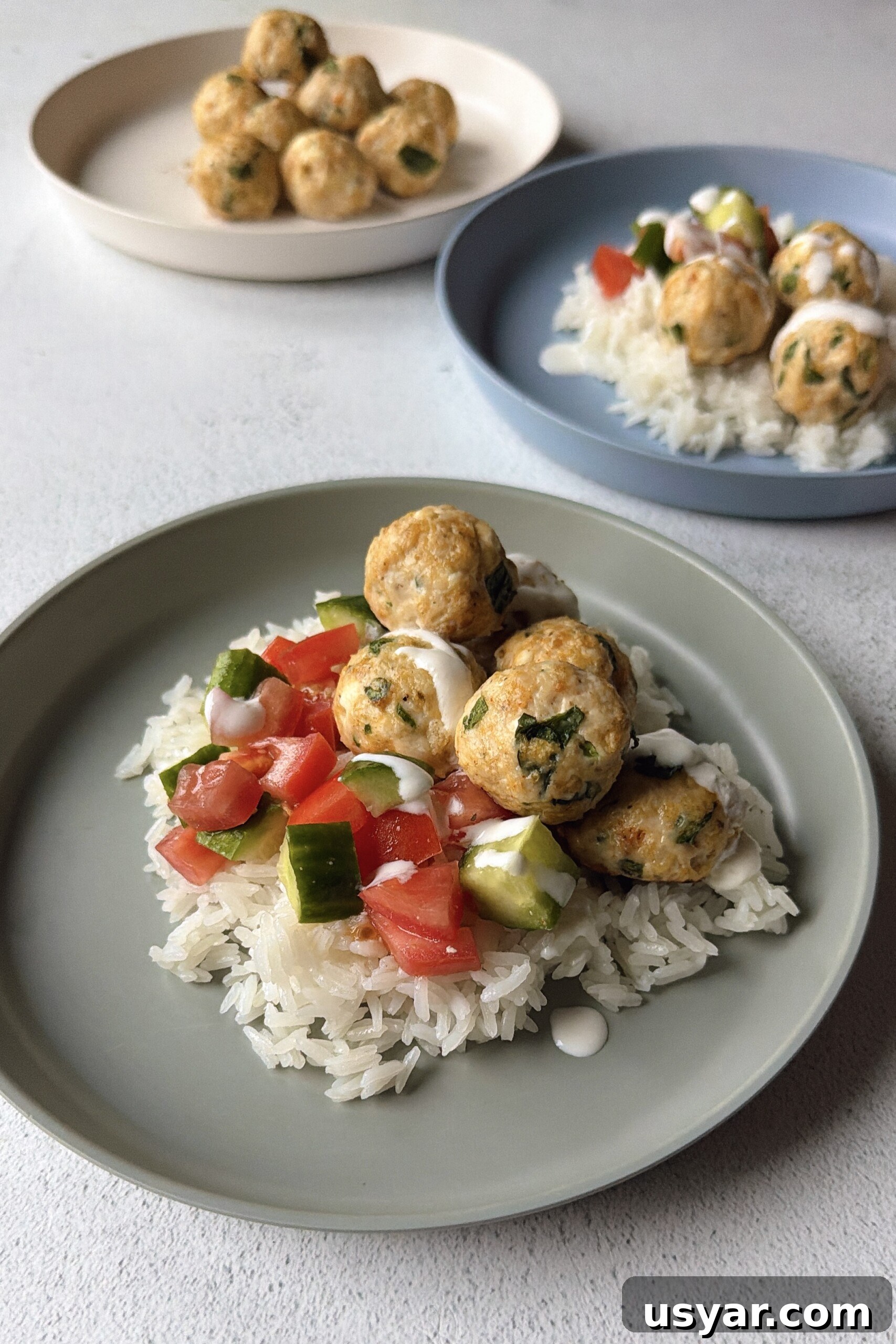 Chicken feta meatballs served over rice.