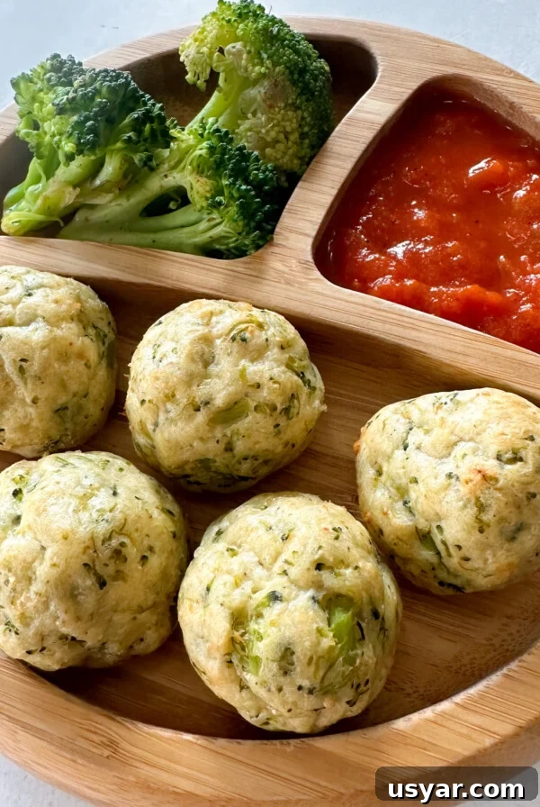 Chicken and broccoli meatballs served with marinara sauce.