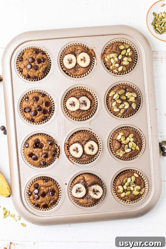 Moist Gluten-Free Banana Muffins Recipe 6 A 12 muffin tin shown with baked gluten free banana muffins.