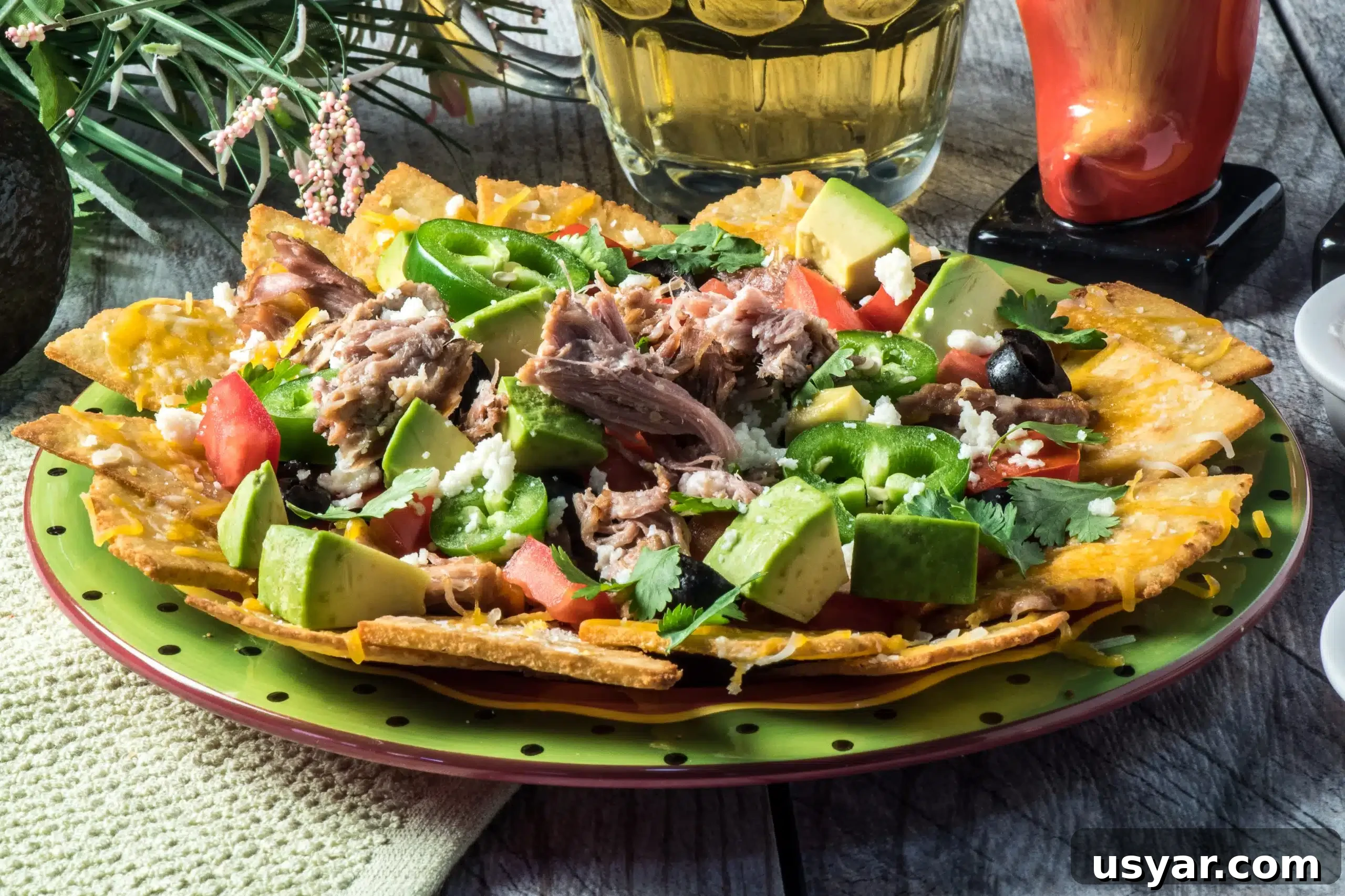 Loaded Pork Carnitas Nachos with Avocado Salsa 7 Almond flour chips