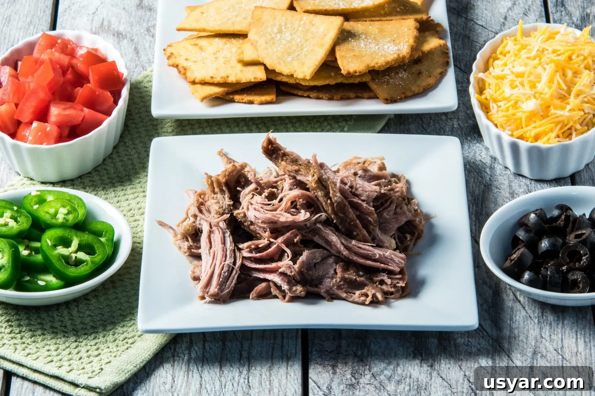 Loaded Pork Carnitas Nachos with Avocado Salsa 4 Carnitas in pot