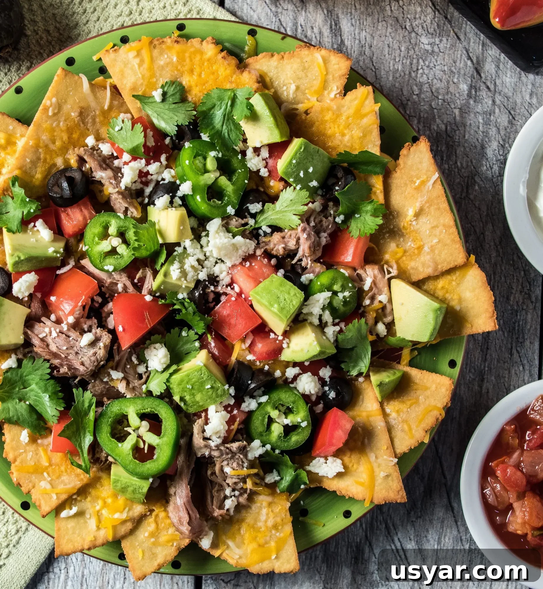Loaded Pork Carnitas Nachos with Avocado Salsa 5 Carnitas shredded