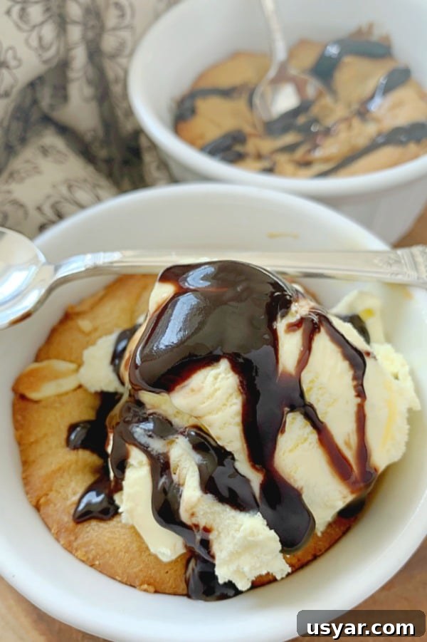 peanut butter cookie cake topped with ice cream