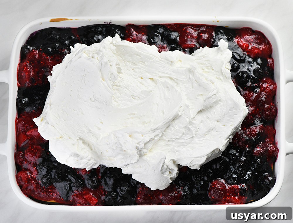 Summer Berry Poke Cake Recipe with Fresh Berries 8 img 15814 7