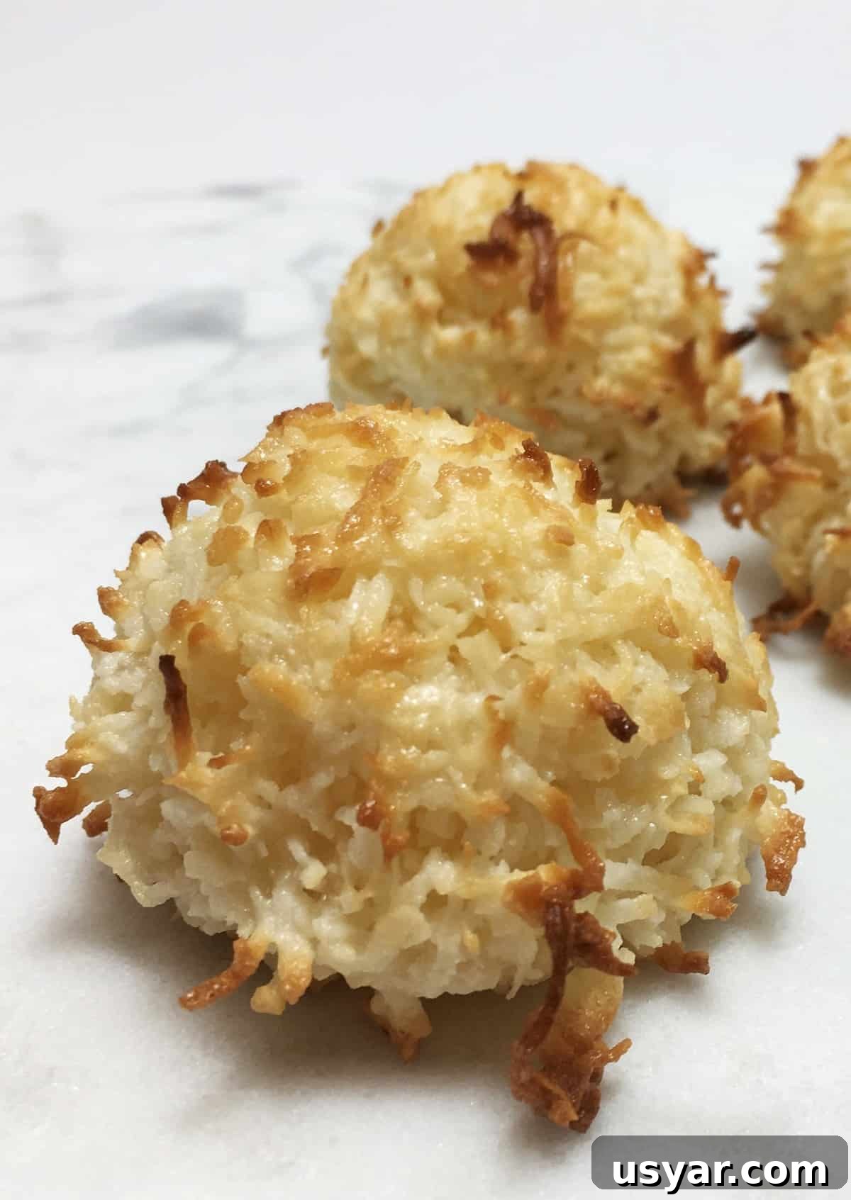 Coconut Macaroons: Congolais vs Rochers Coco 3 A small batch of French coconut macaroons on a marble table
