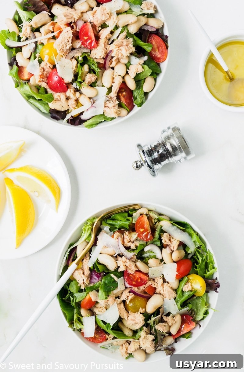 Mediterranean White Bean and Tuna Salad Recipe 4 White Bean and Tuna Salad bowls served with a lemon and olive oil vinaigrette on the side.