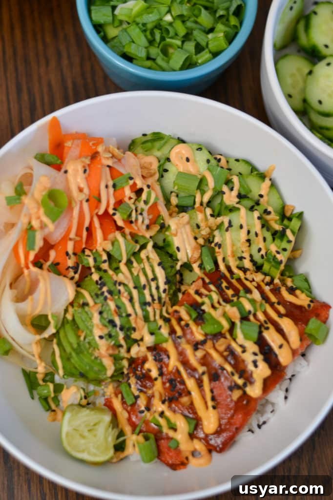 Teriyaki Salmon Rice Bowls with Sesame and Scallions 4 Finished teriyaki salmon rice bowls ready to serve