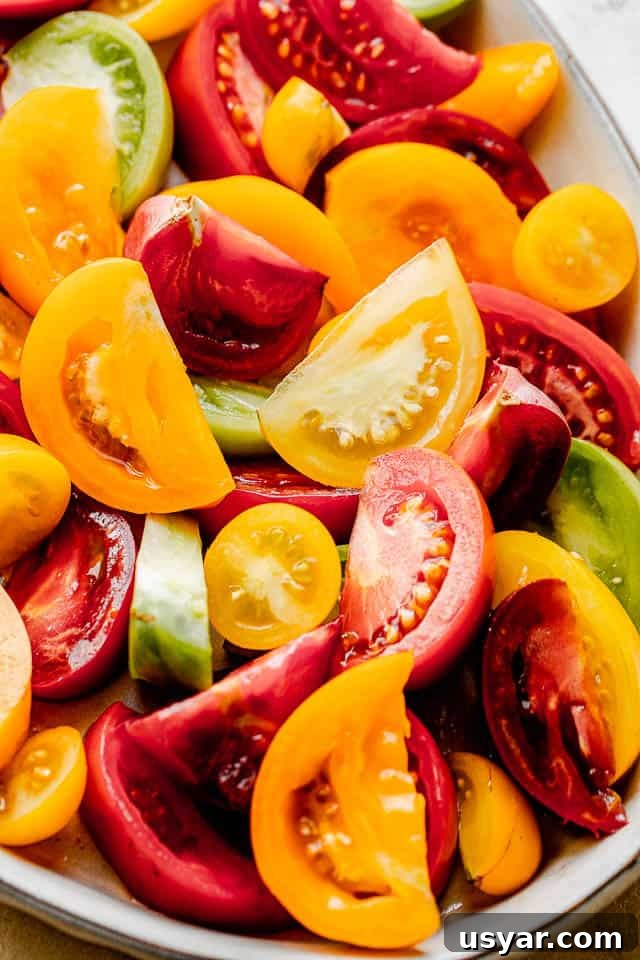 Heirloom Tomato Salad with Basil Vinaigrette 3 slices of heirloom tomatoes