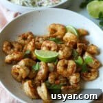 Marinated and grilled shrimp topped with lime and cilantro.