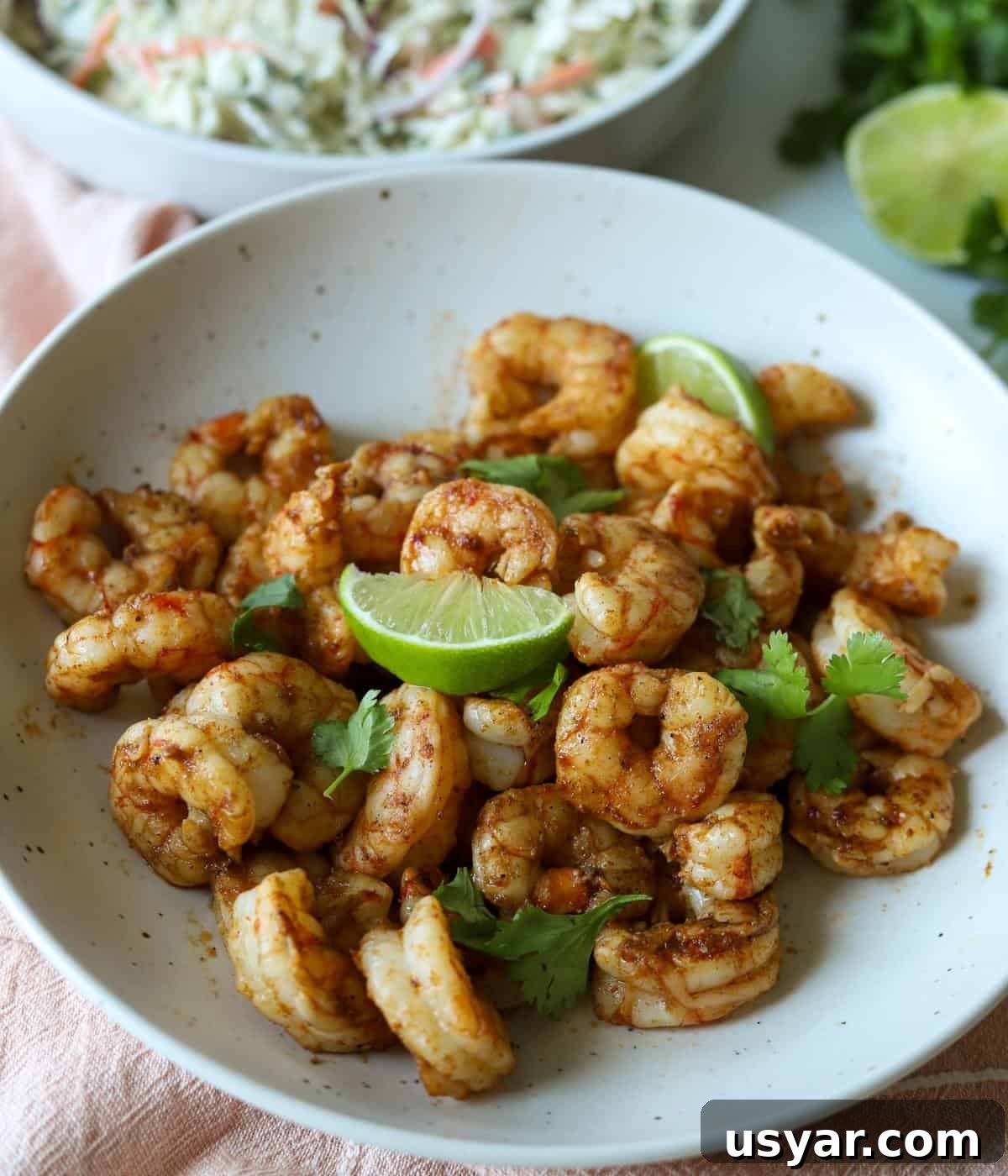 Garlic Butter Shrimp on a Blackstone Griddle 7 Marinated and grilled shrimp topped with lime and cilantro.