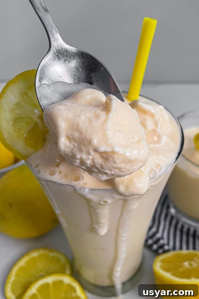 Homemade Chick-fil-A Frosted Lemonade Copycat Recipe 3 close up shot of Chick-fil-A frosted lemonade on a spoon