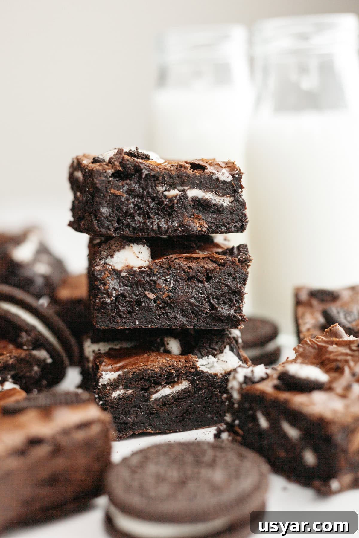 A stack of three fudgy Oreo brownies.