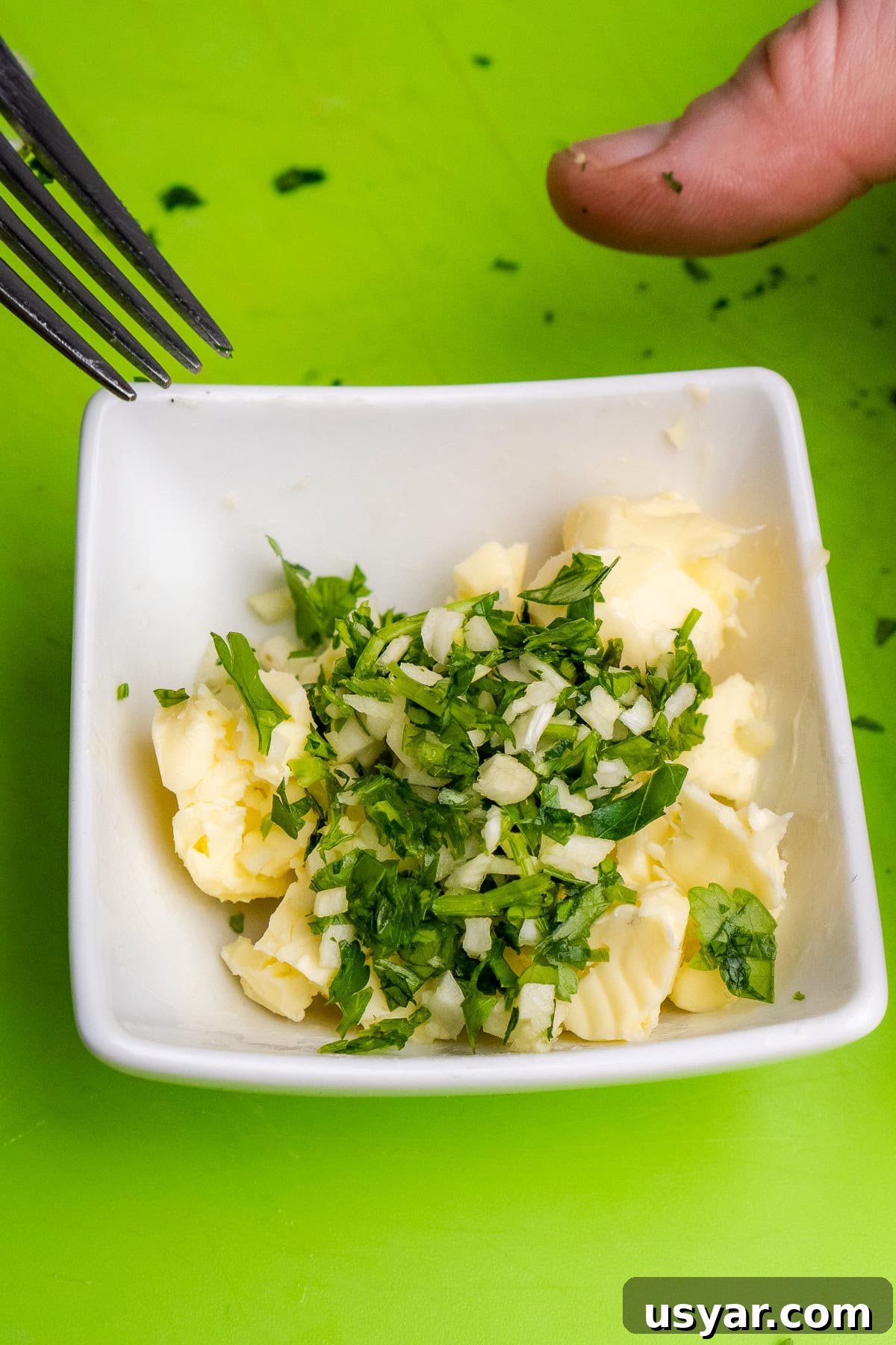Butter,chopped garlic and chopped fresh parsley in a small dish