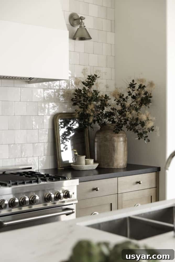 Dream kitchen design with white oak cabinets and white backsplash tile.