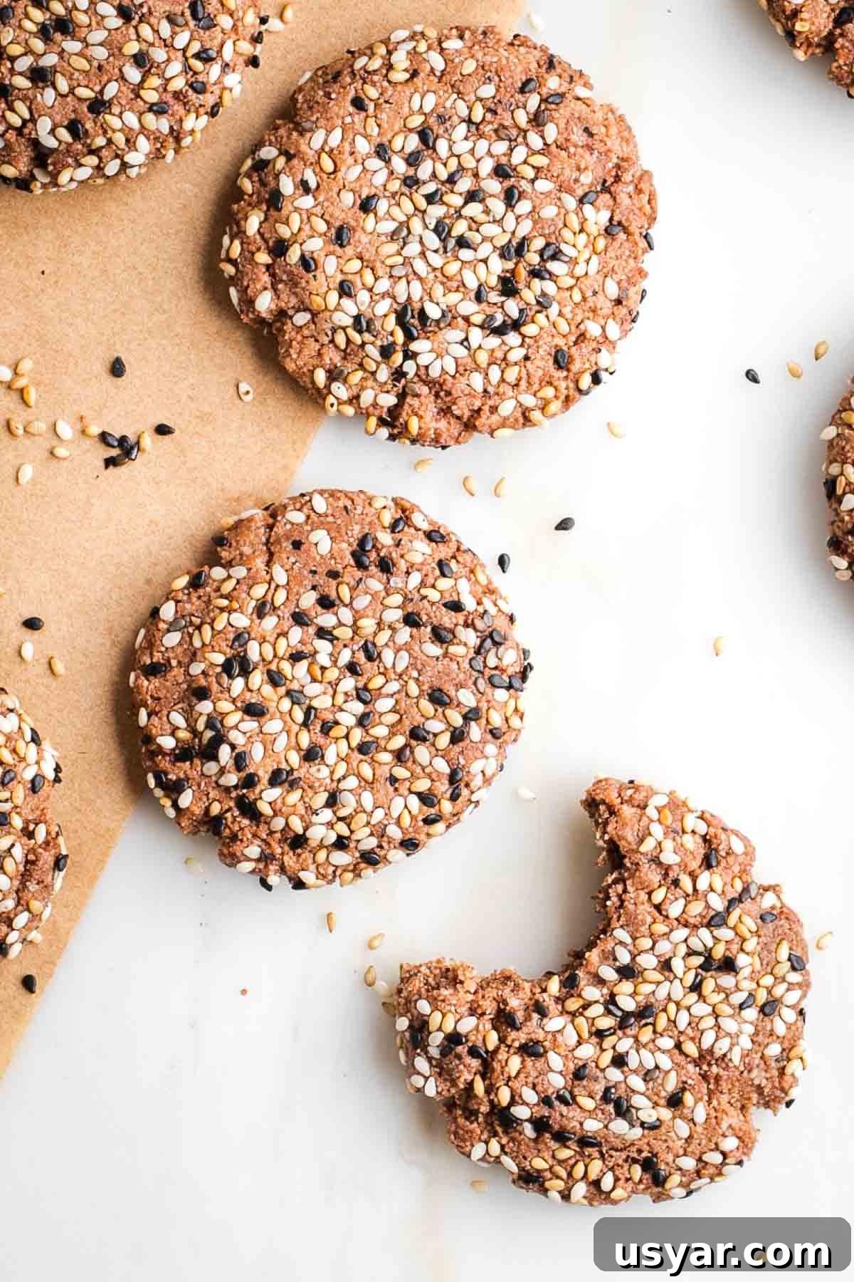 Crispy Sesame Seed Cookies Recipe 13 Sesame seed cookies on a plate.