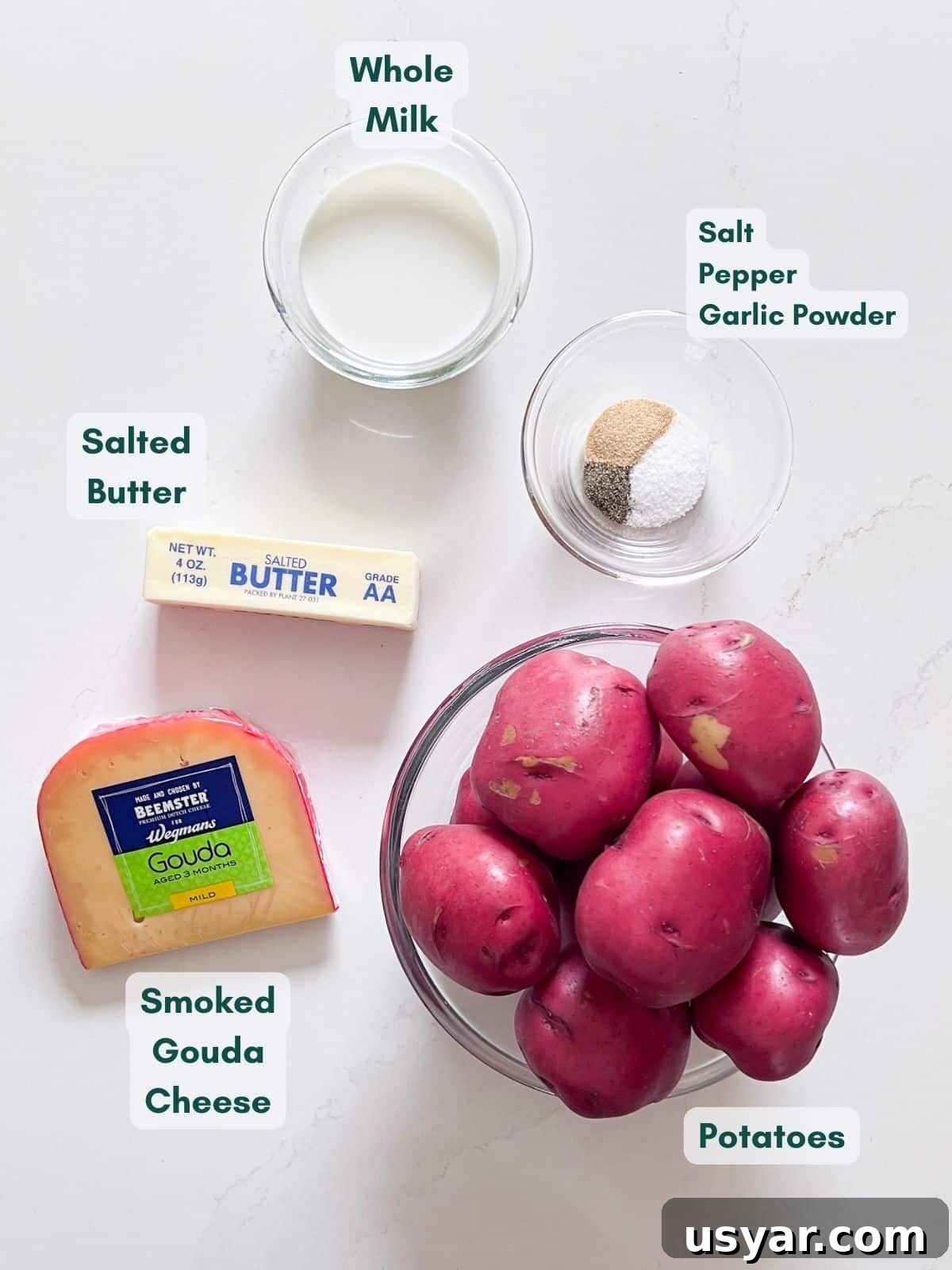 Creamy Gouda Mashed Potatoes 4 An overhead image of the ingredients labeled for gouda cheese mashed potatoes.