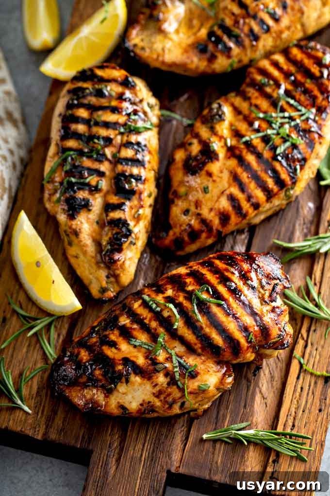 Tangy Balsamic Marinade for Chicken 4 Grilled chicken breast on a cutting board