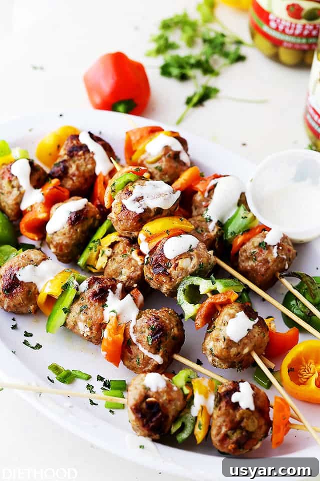 Grilled Turkey Meatball Skewers with Lemon Herb Glaze 5 Turkey meatballs and bell pepper slices on skewers, and drizzled with homemade garlic yogurt sauce.