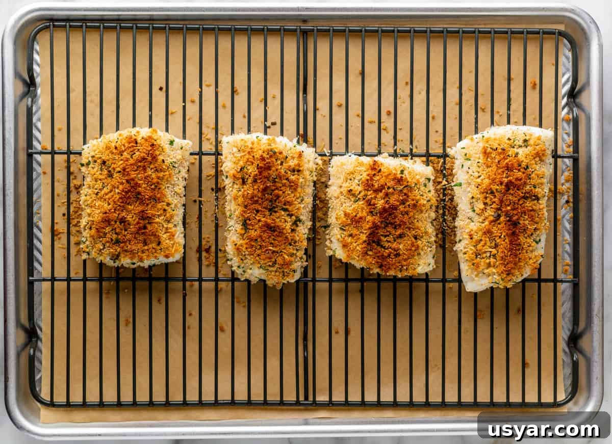 Parmesan Baked Cod with Garlic and Lemon 10 cod topped with parmesan mixture after baking.