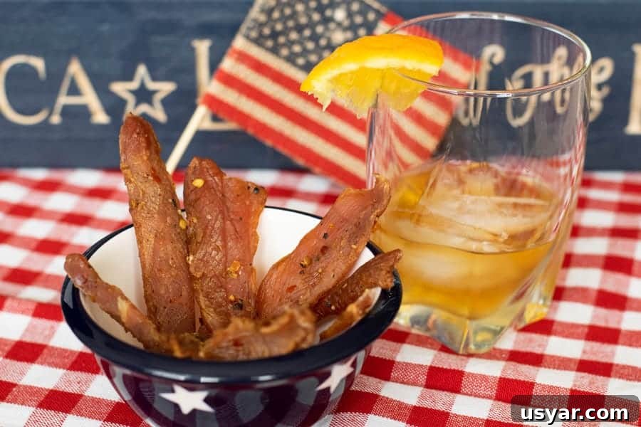 Citrus Bourbon Turkey Jerky Recipe 2 Citrus Bourbon Jerky with american flag with glass of bourbon
